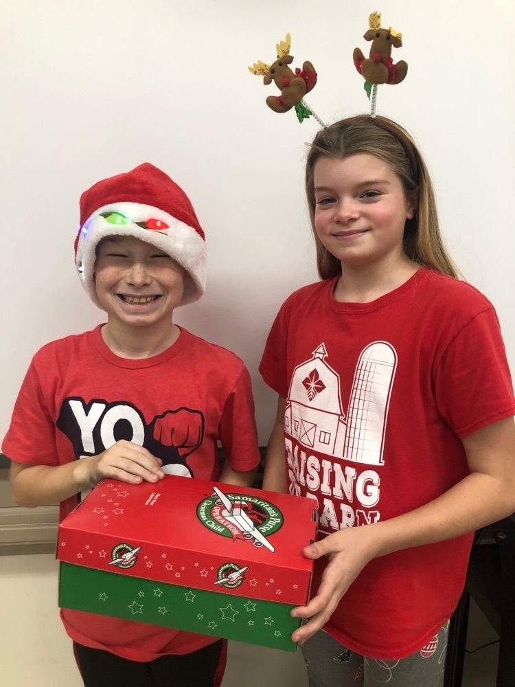 Students with Operation Christmas Child box