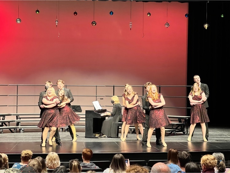 students singing and dancing