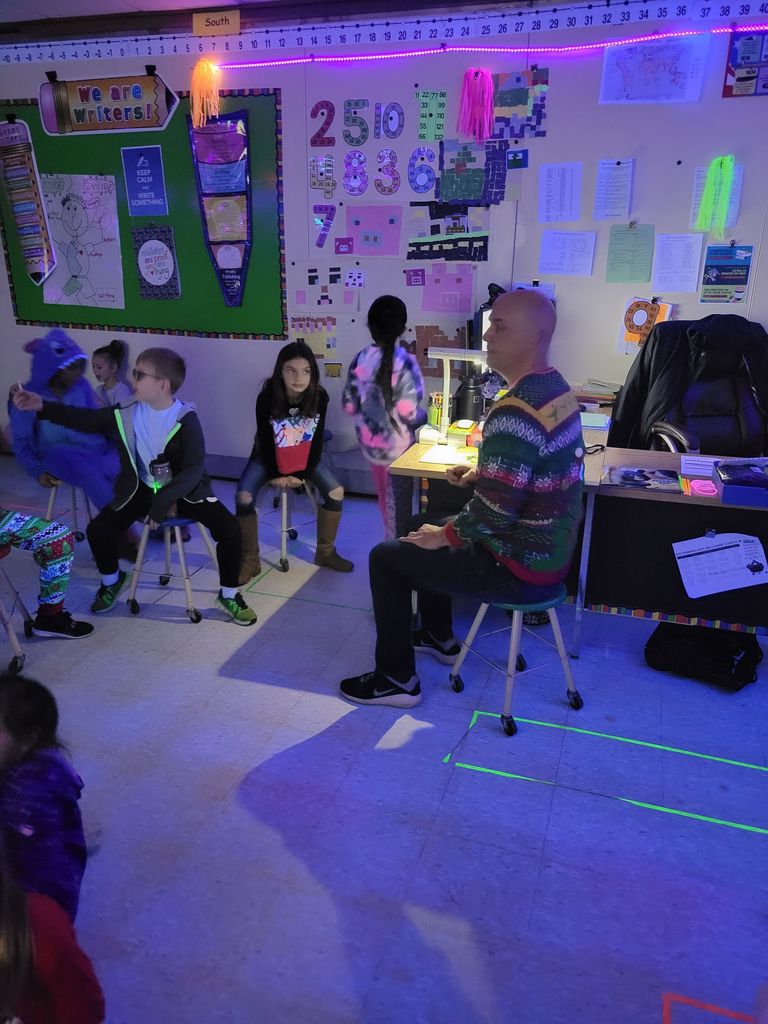 Mr. Weatherwax reading a story