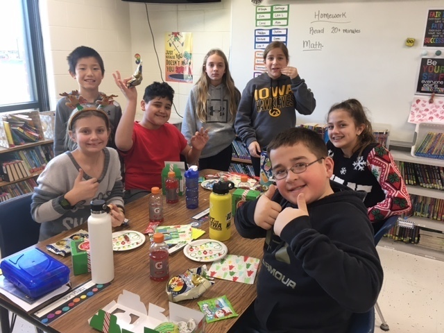 Students eating holiday party treats