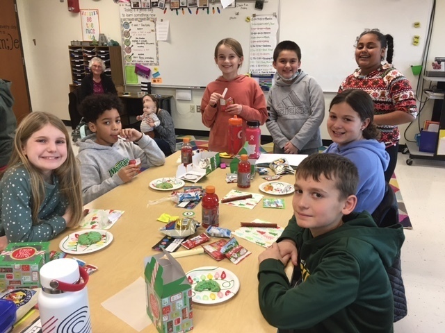 Students eating holiday party treats