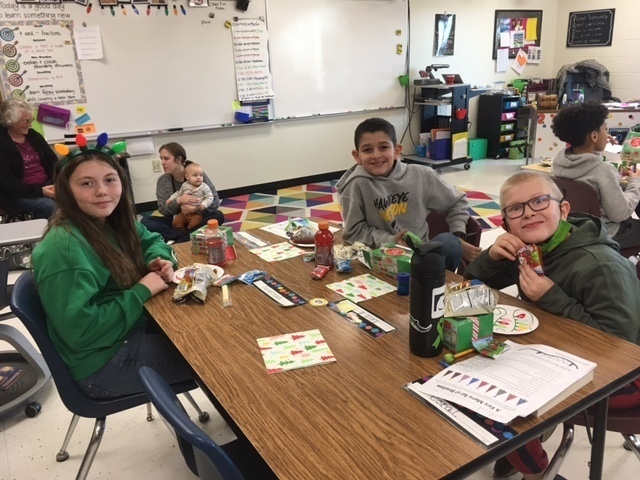 Students eating holiday party treats