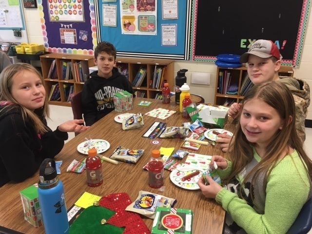 Students eating holiday party treats