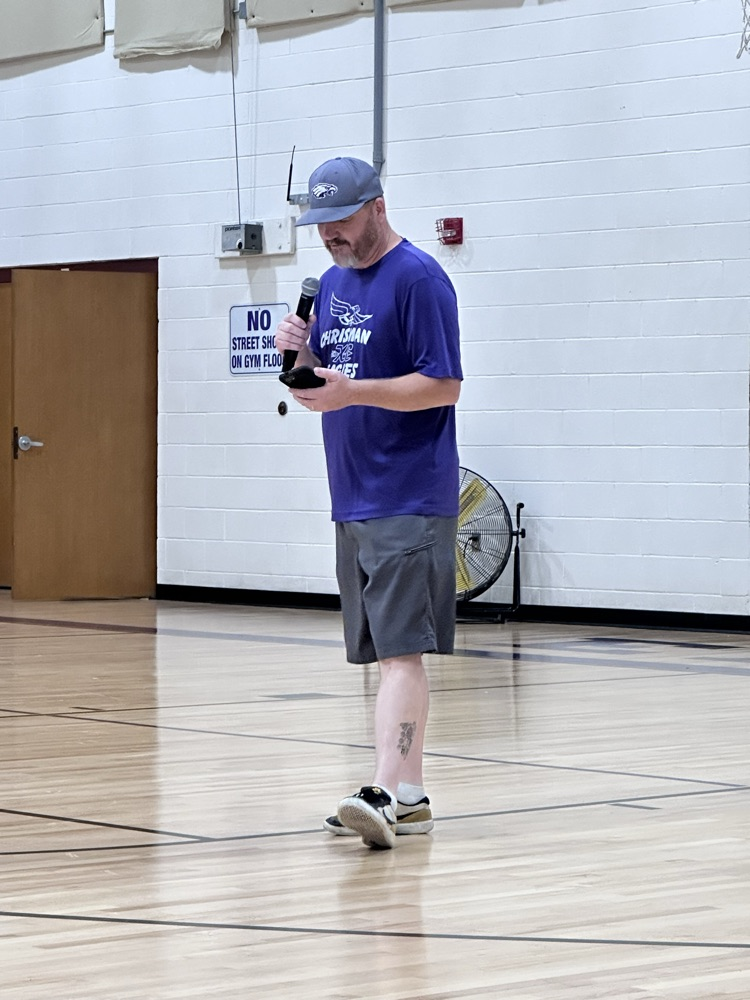 coach giving opening remarks