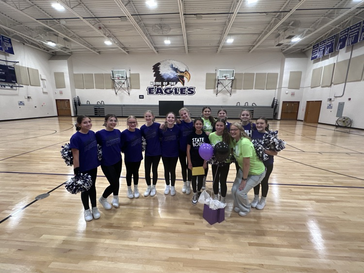 the cheerleaders and Coach Jen