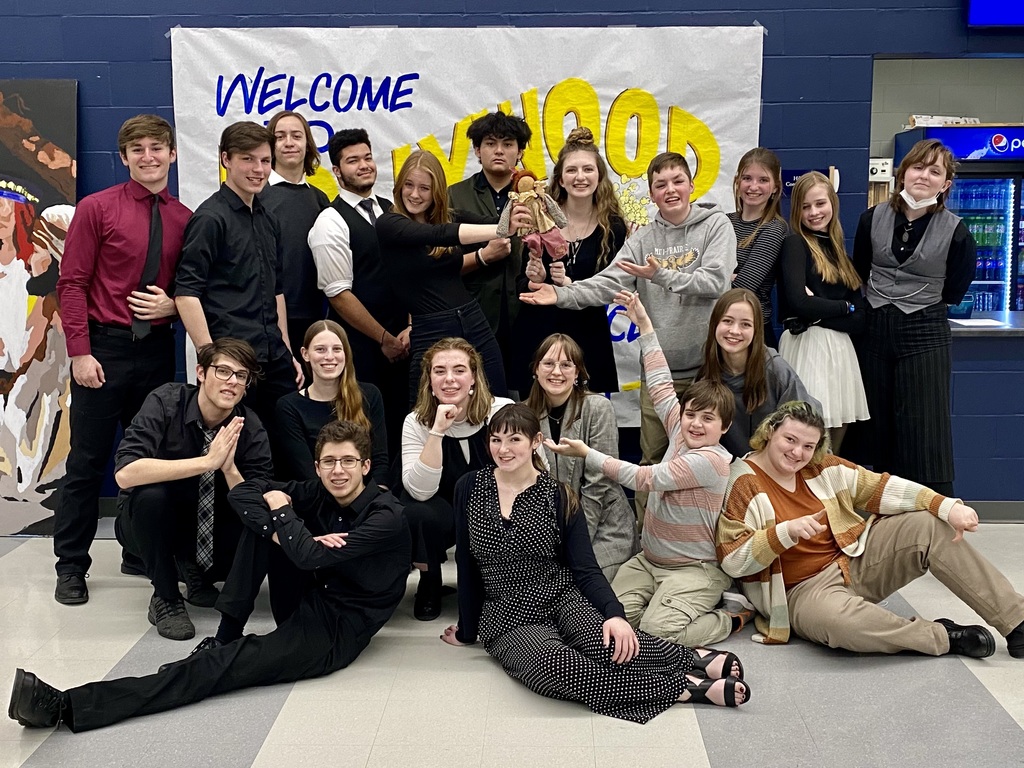 Speech students posing with award