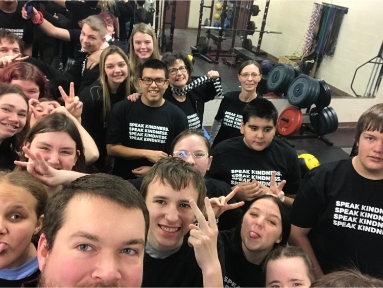 students and staff with black shirts on