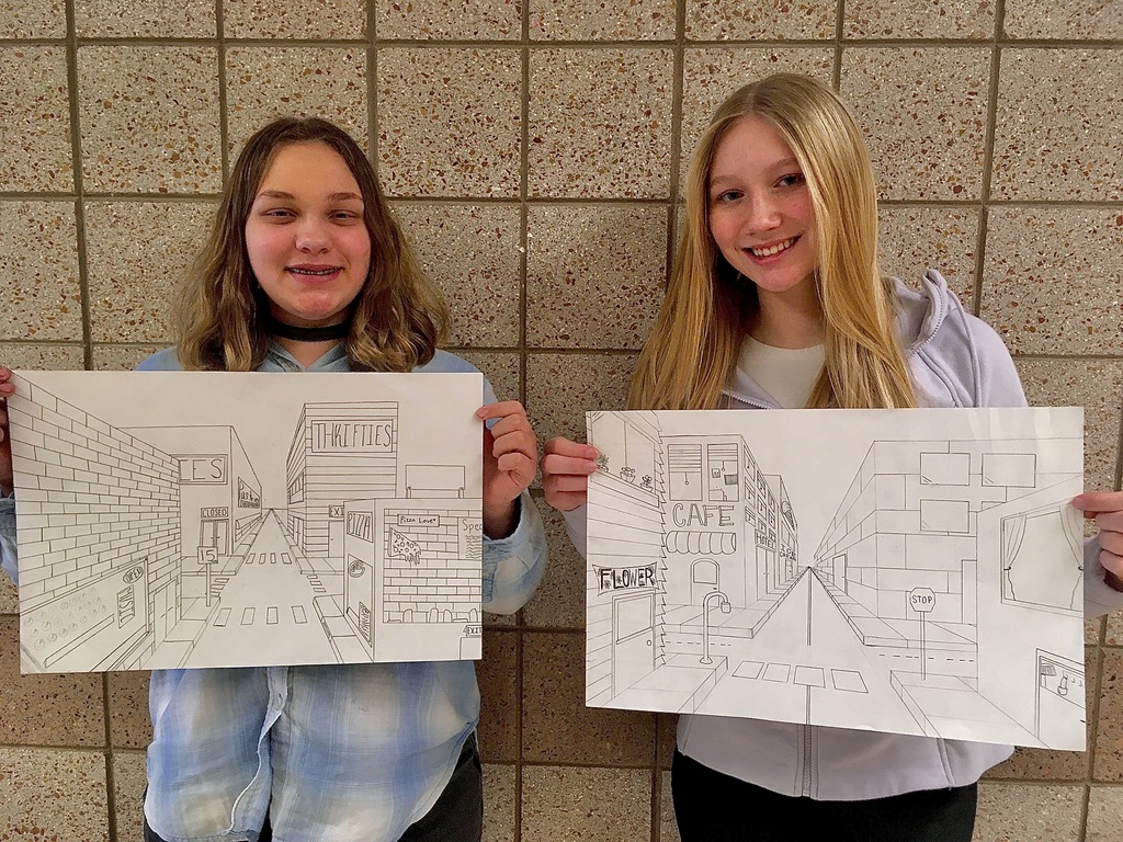 two female students with 1 point city block drawing