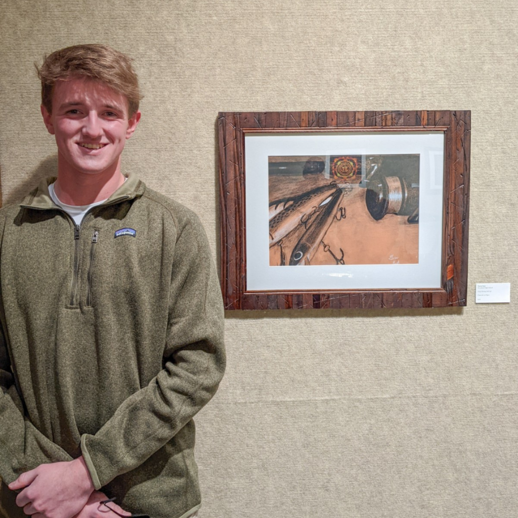 Gavin Gast with his artwork