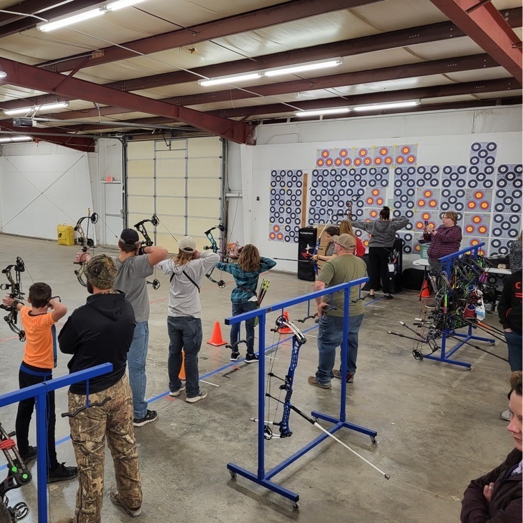 kids shooting bows