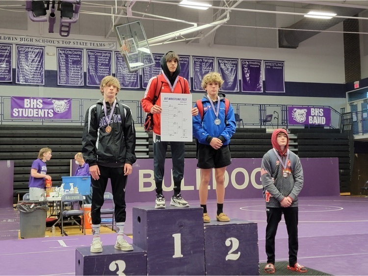 posing on a podium