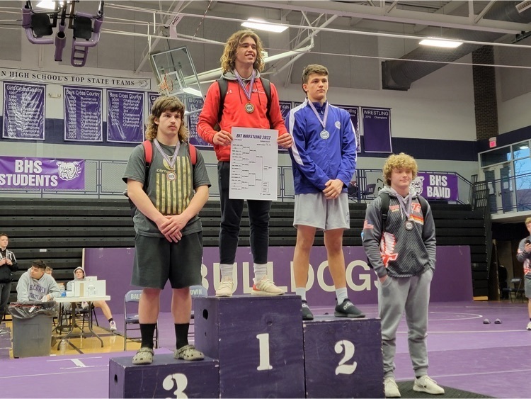 posing on a podium
