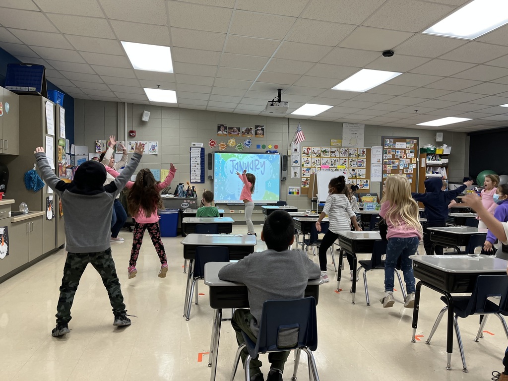 Kids exercising in a classroom