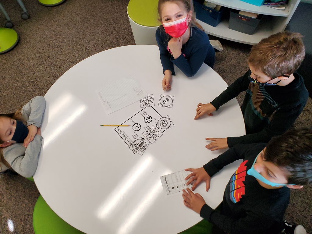 These 2nd graders "BROKE OUT" of the box! They collaborated to solve puzzles involving time and money in order to crack the codes for different locks!