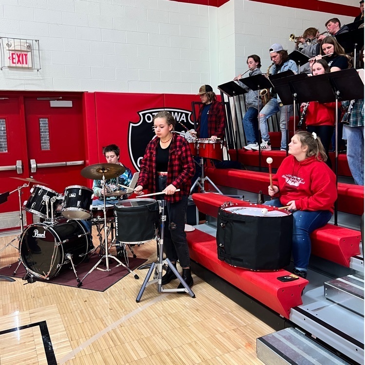kids playing band instruments