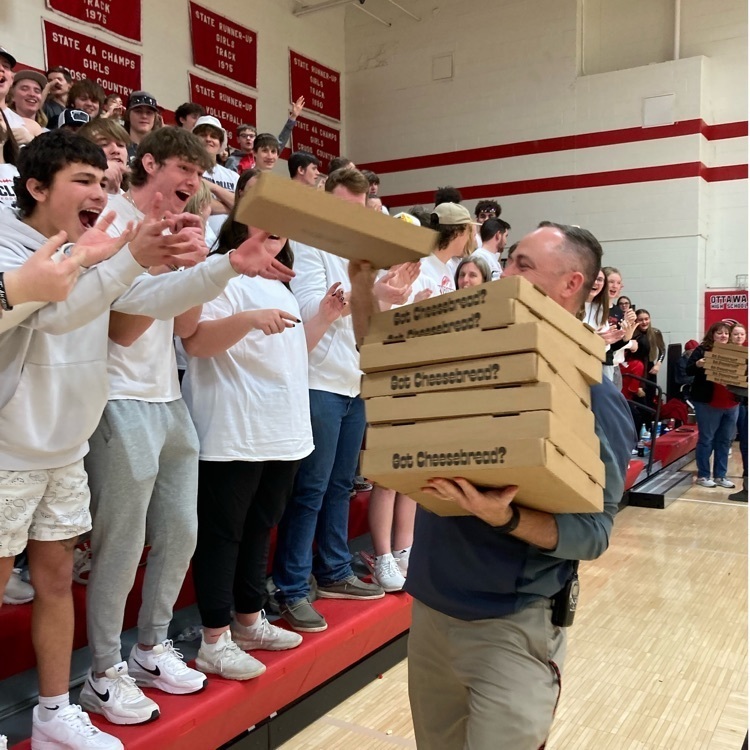 handing out pizza