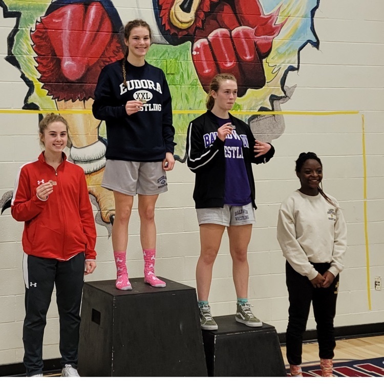 posing on podium