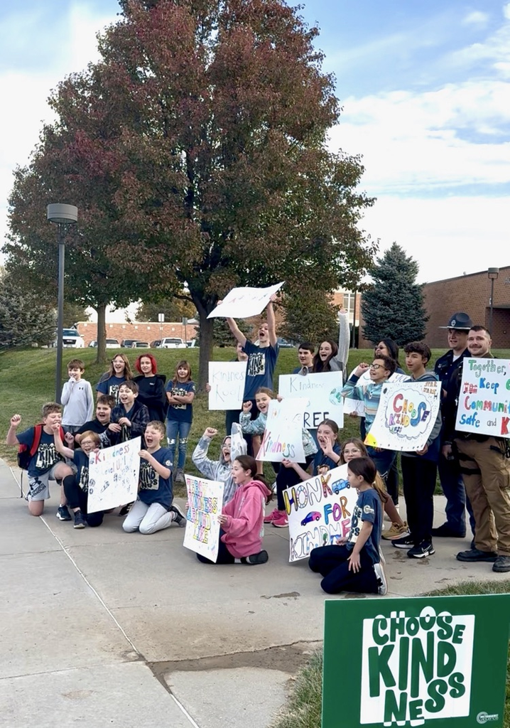 students holding signs