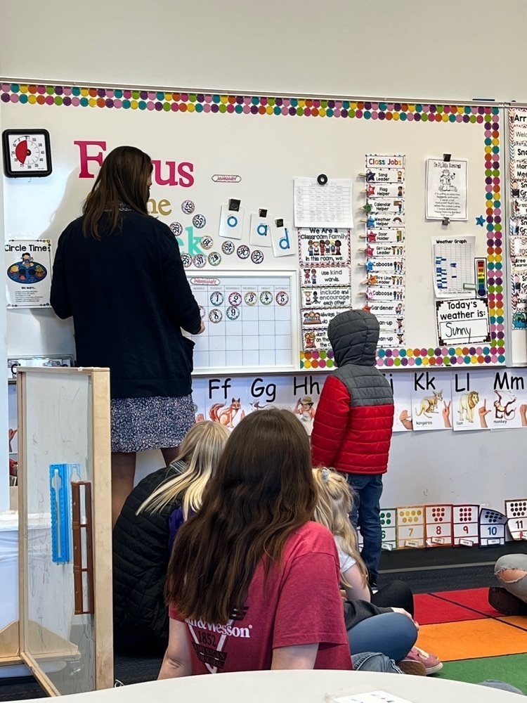 teacher working with kids
