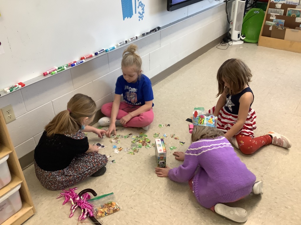 Florence 2nd Graders completing 100 piece puzzles