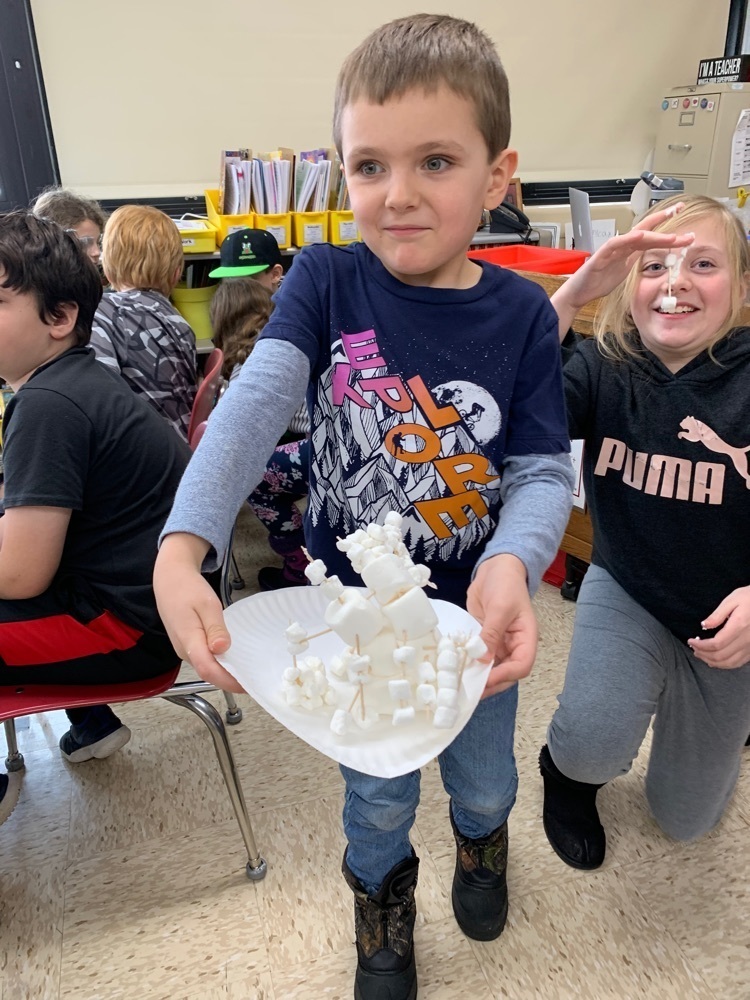 student with snowman