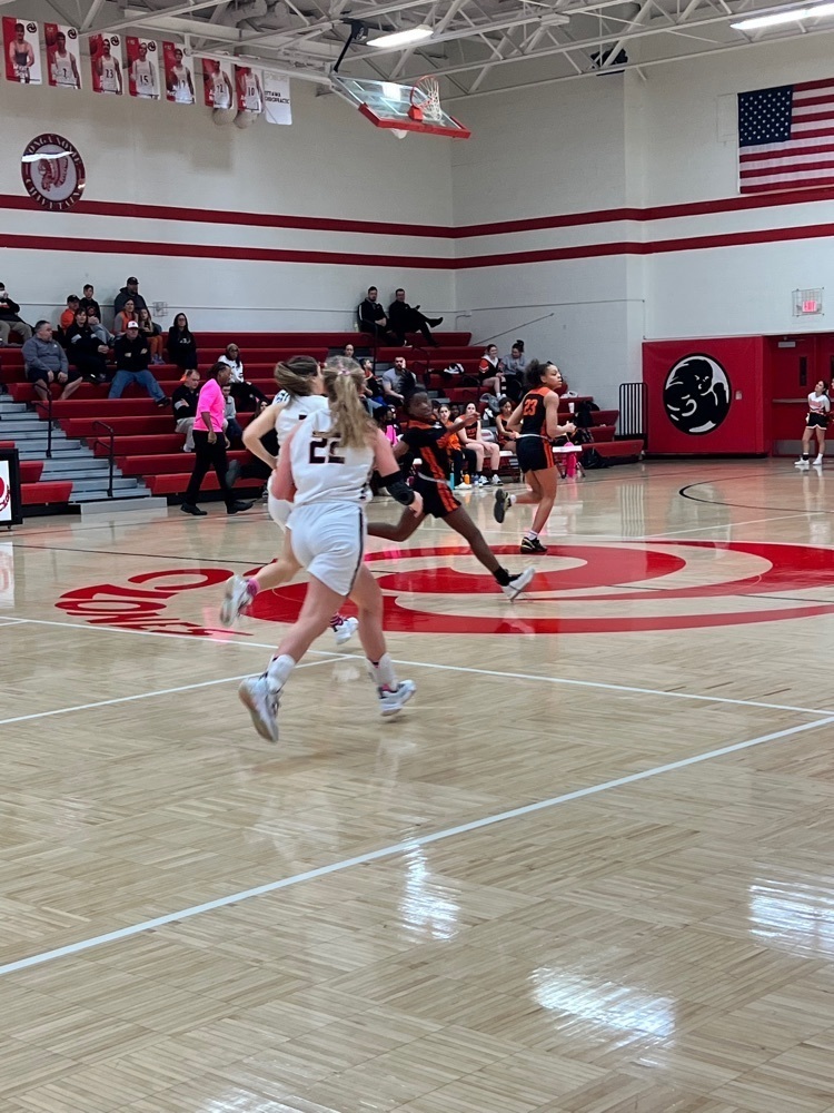 girls playing basketball