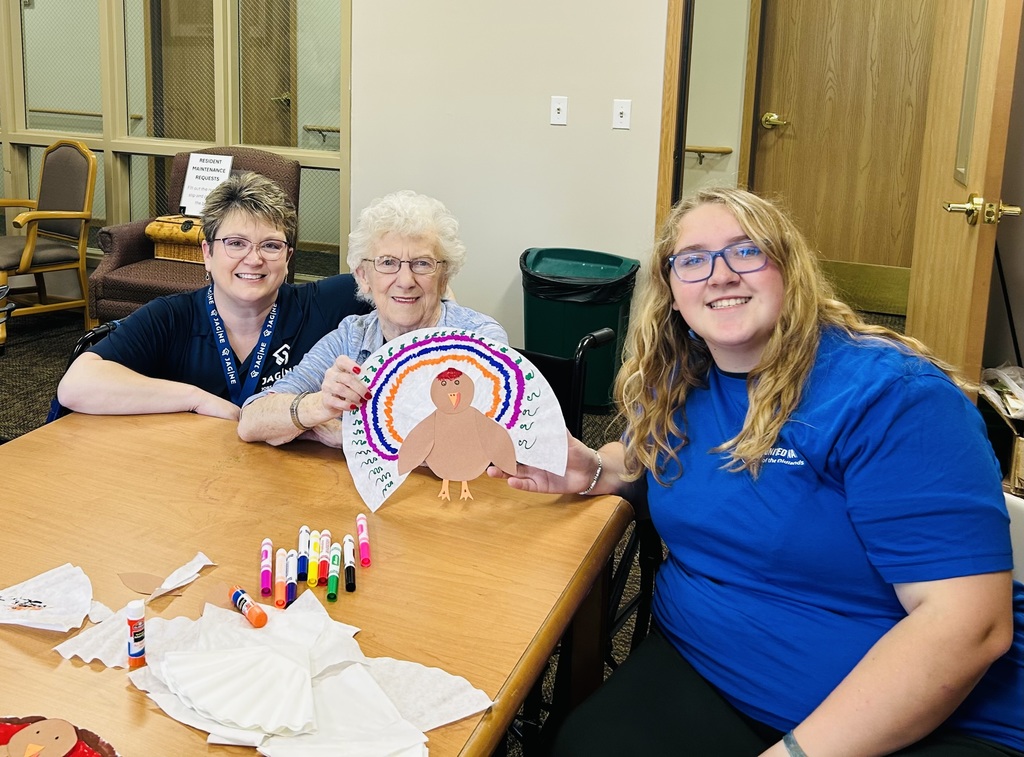 Women showing turkey picture