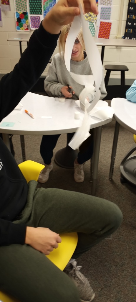 Students making geometry valentines