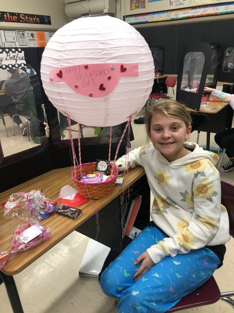 student with Valentine’s box