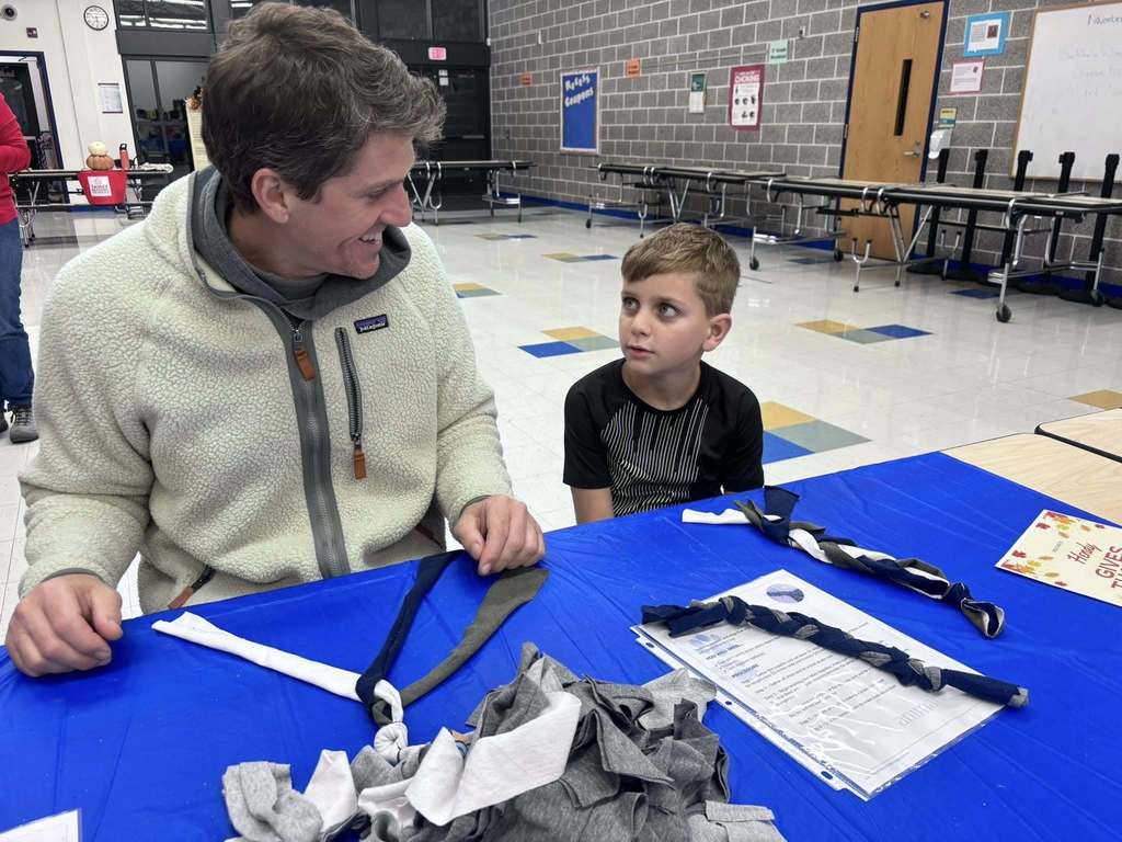Students and parents participating at theThanksgiving activity