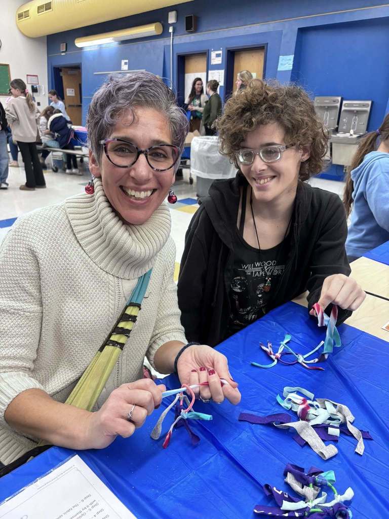 Students and parents participating at theThanksgiving activity