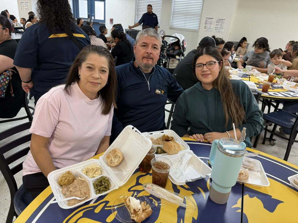 Parents and students enjoying the Thanksgiving dinner