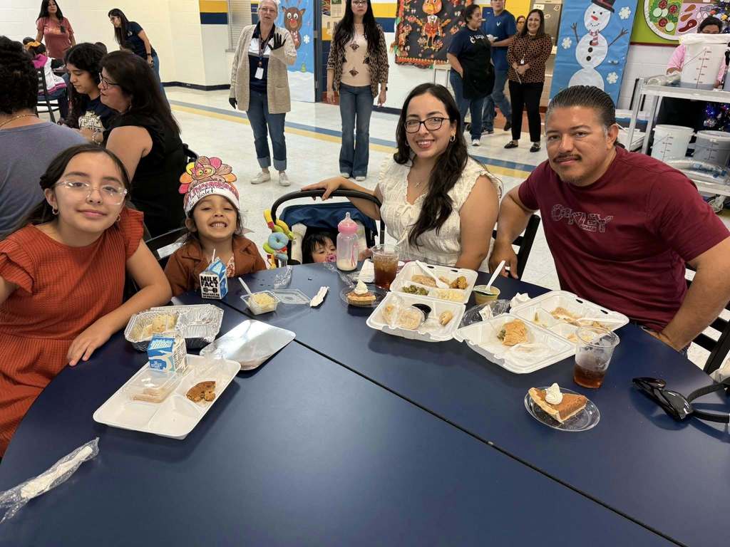 Parents and students enjoying the Thanksgiving dinner