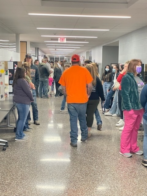 walking down a hallway 