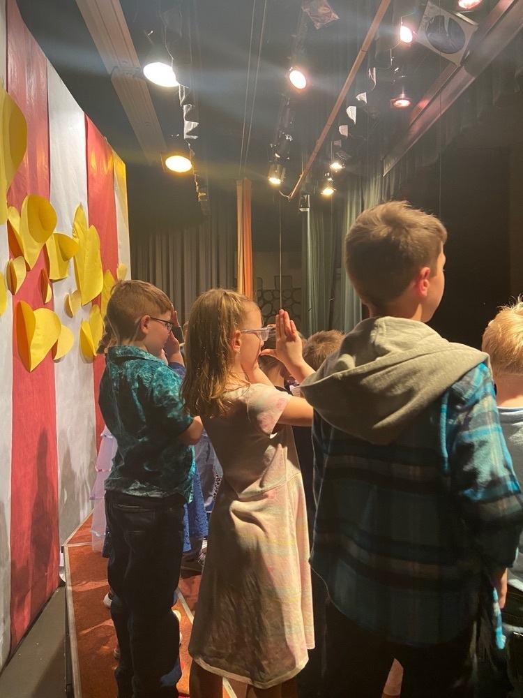 First grade students performing during musical.