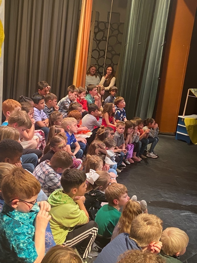 First grade students performing during musical.