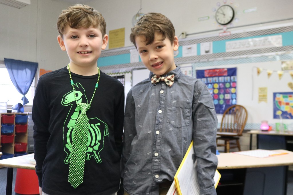 Two boys with ties.