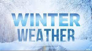 Winter Weather in blue font with snow covered road and trees