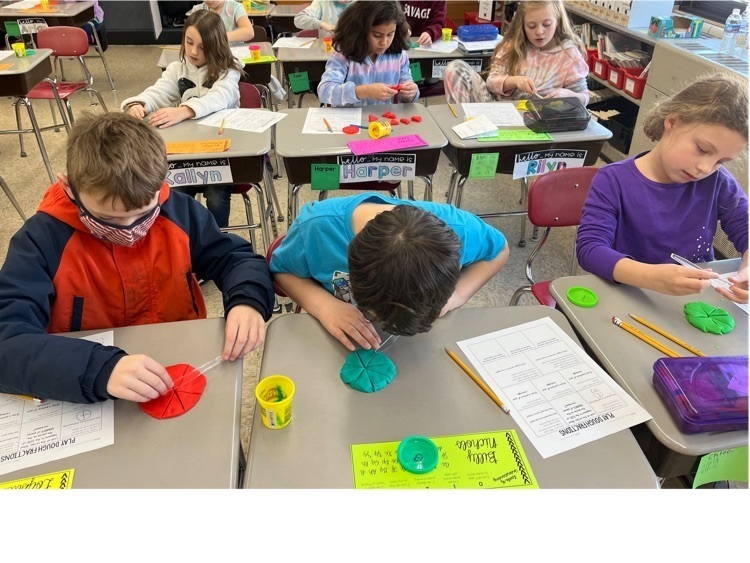 students learning fractions