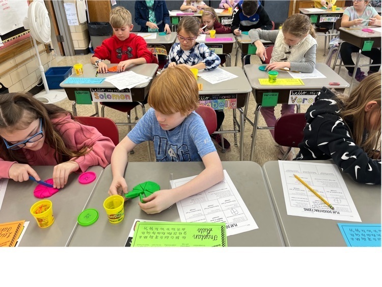 students learning fractions