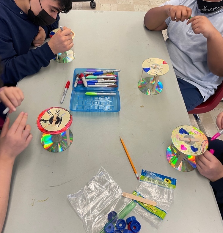 image of students at with rubber band racers 