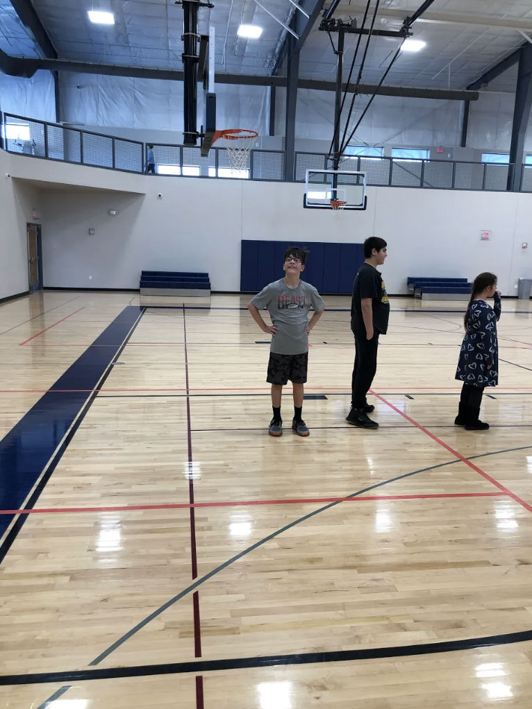 Students playing in the gym