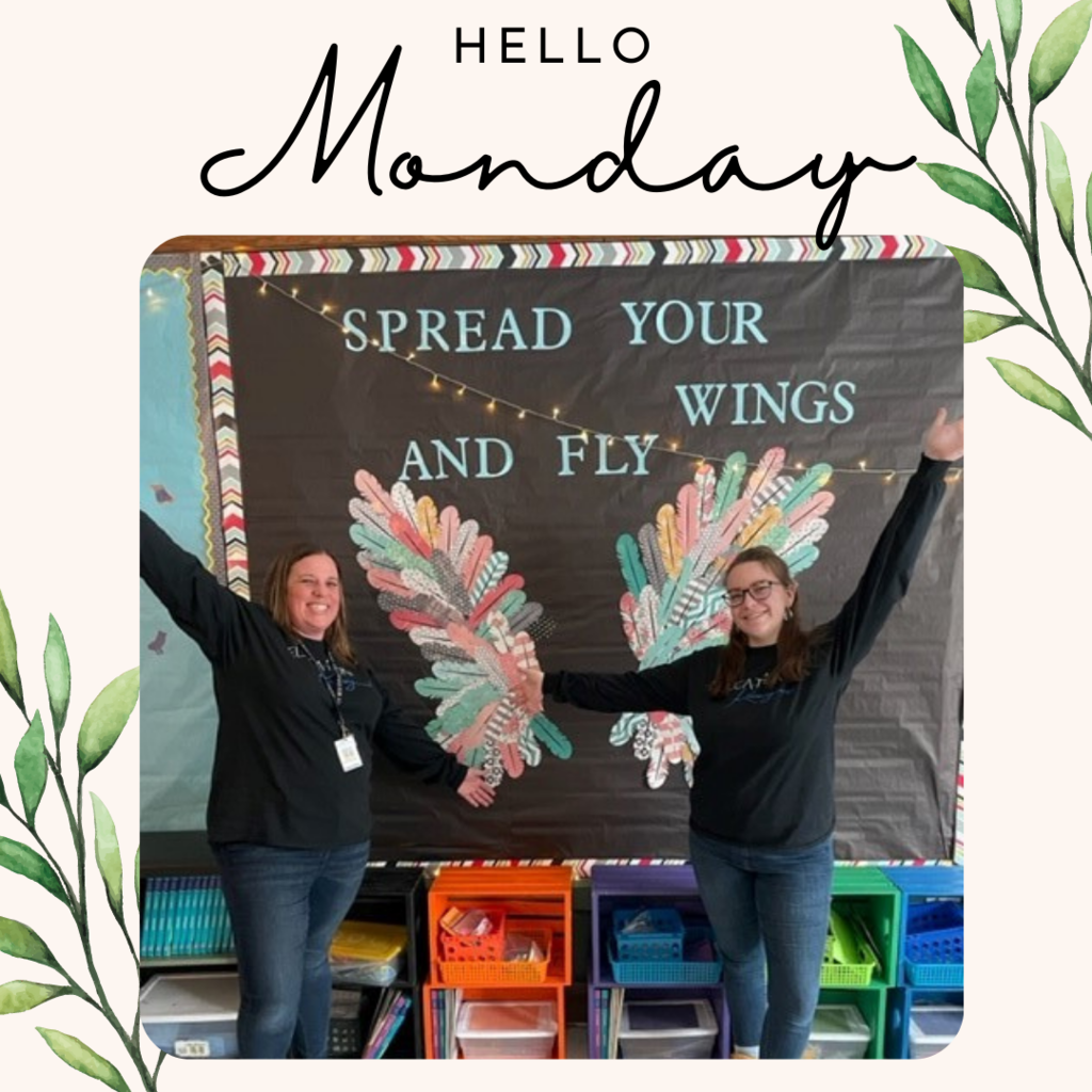 Two women spreading their arms like wings