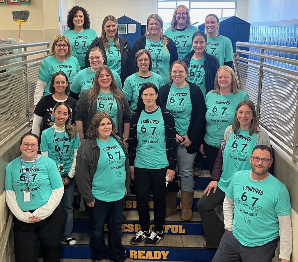 Staff wearing 6-7 shirts