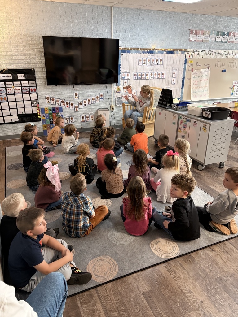 Preschool and kindergarten students reading 