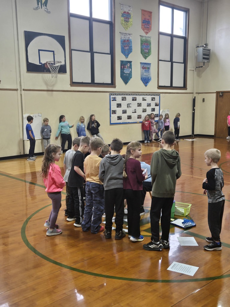 K-3rd Grade students in the gym.