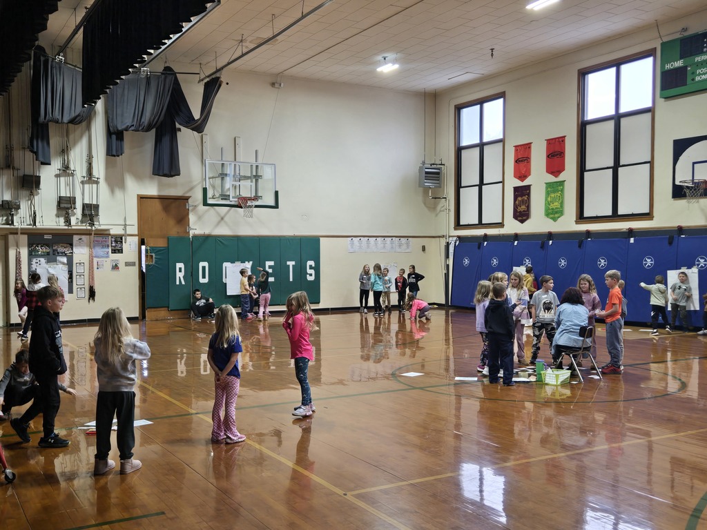 K-3rd Grade students in the gym.
