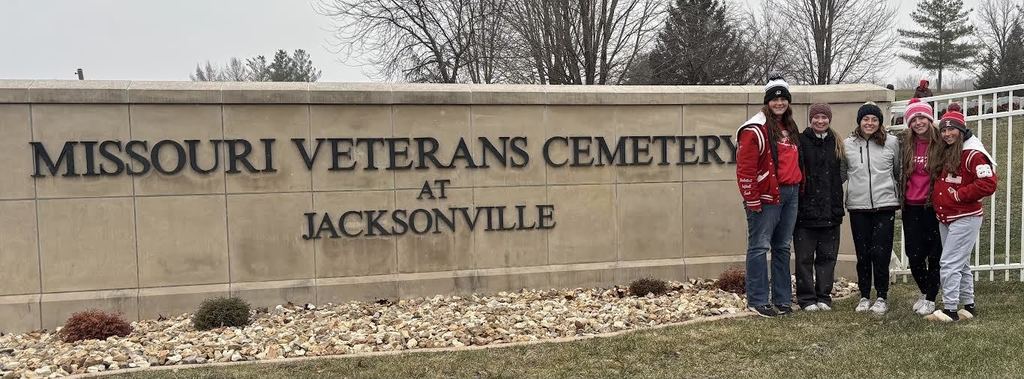 On December 13, seniors Mylie Morse, Layne Mack, Hannah Mitchell, and Macy Davison, along with junior Emmagin Travis, participated in the Wreaths Across America event at the Missouri Veterans Cemetery in Jacksonville, Missouri, helping honor and remember the men and women who served our country by laying wreaths at each site. This event was part of the RootEd program at LHS.