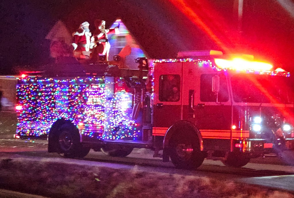 firetruck with lights and Santa
