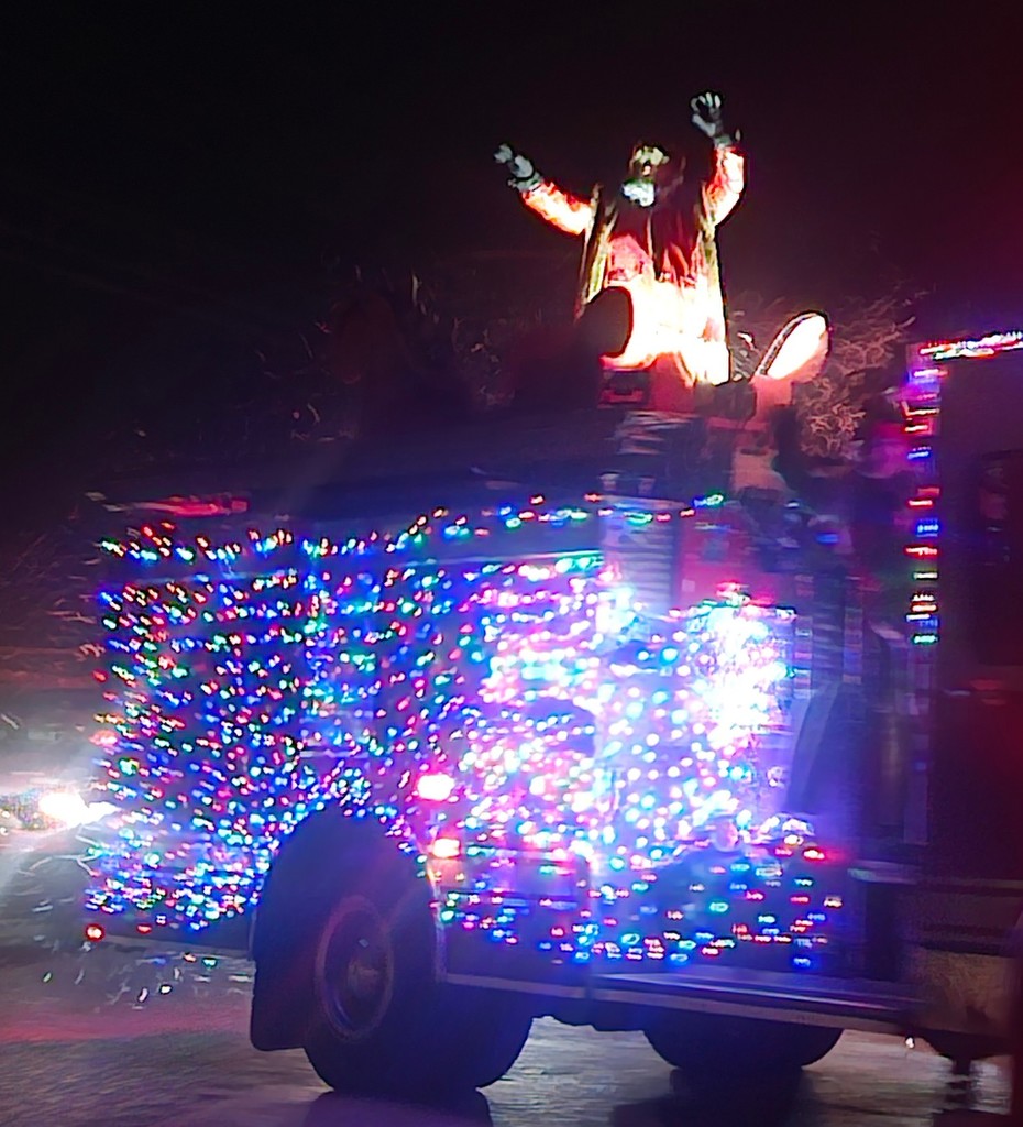 firetruck with lights and Santa